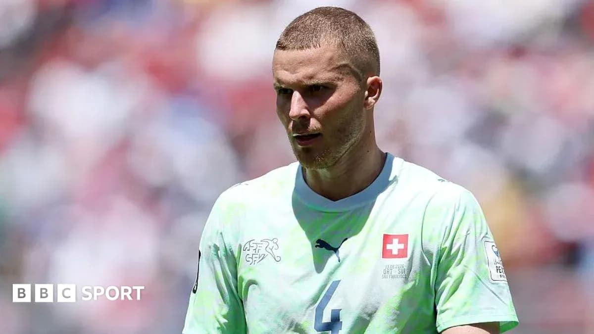 Player in Swiss jersey during match on field