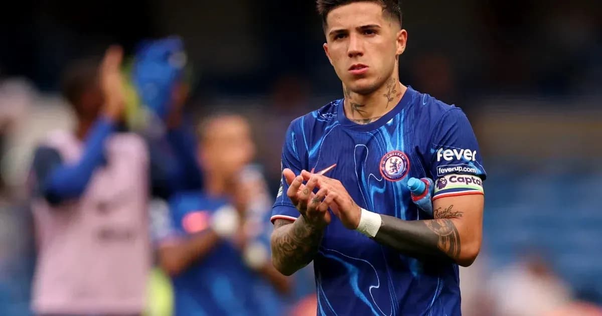 Player applauding fans in Chelsea kit