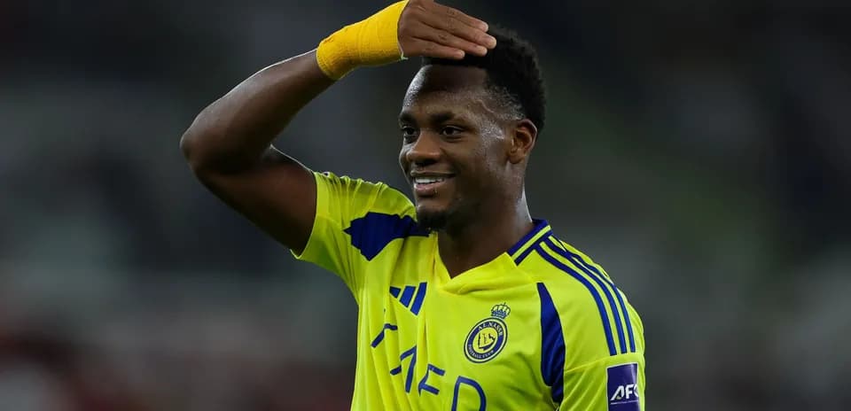 Player celebrating with a hand gesture during match