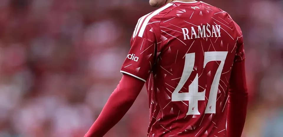 Player in red jersey with number 47 on field