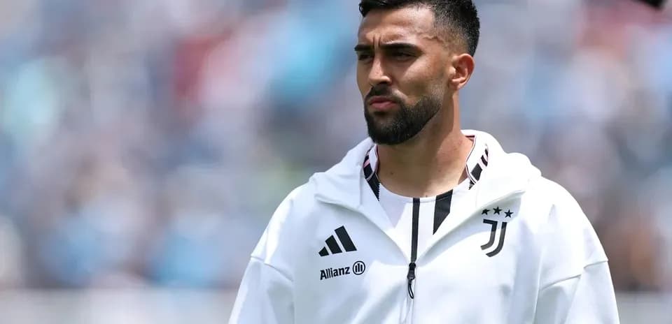 Juventus player in warm-up jacket before match