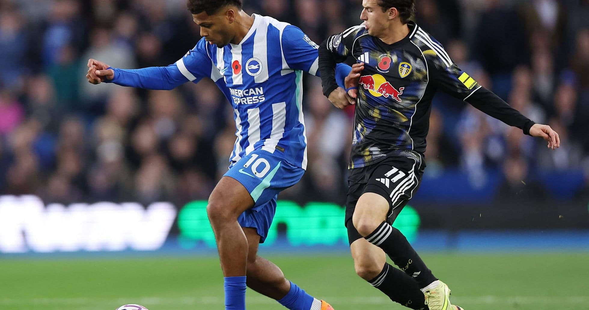 Player tackling during Leeds vs Brighton match