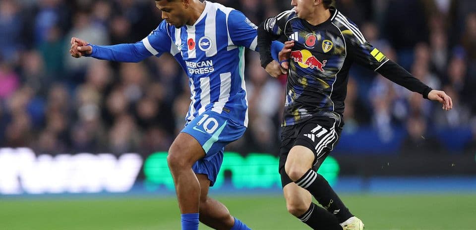 Player tackling during Leeds vs Brighton match