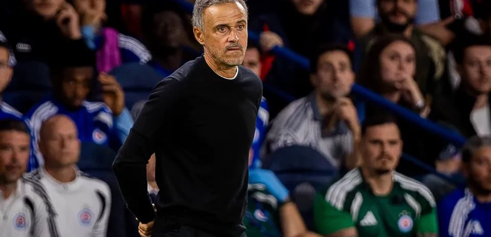 Manager observing the game from the sidelines