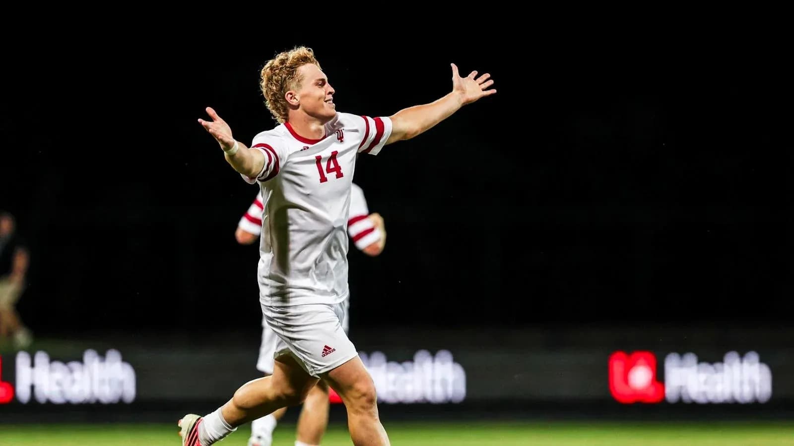 Player celebrating a goal during soccer match