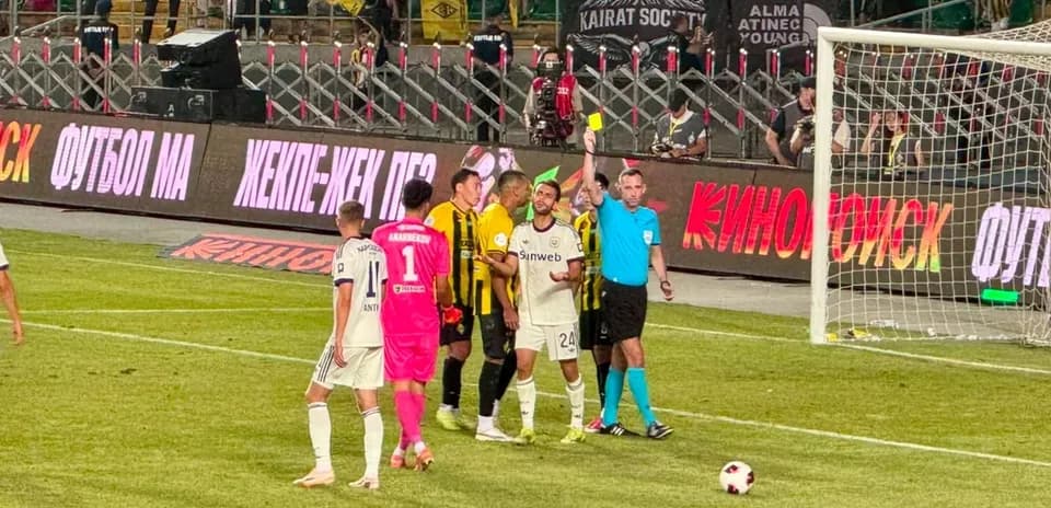 Players and referee during Anderlecht vs Kairat match