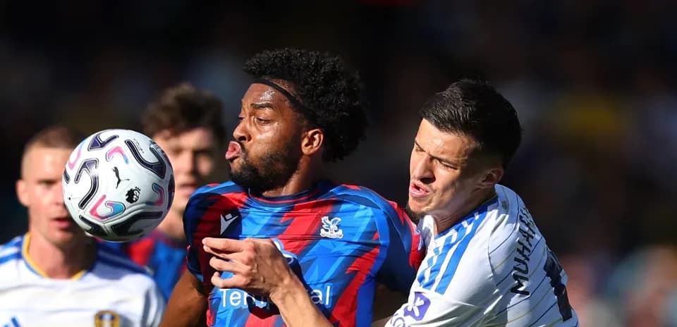 Player battling for the ball during match action