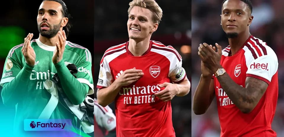 Three Arsenal players celebrating during a match