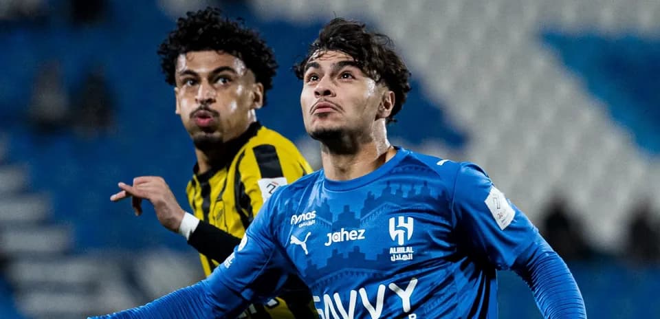 Two players in action during a football match