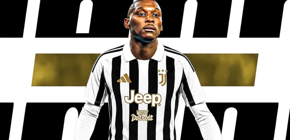 Player in Juventus jersey posing confidently