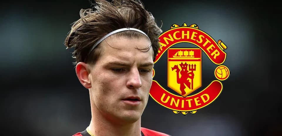 Player in red and black jersey with Manchester United logo