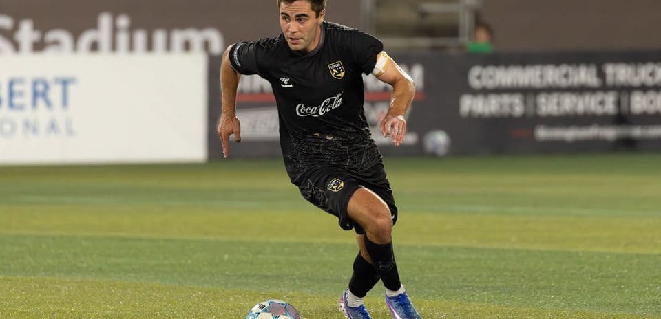Player dribbling during Birmingham Legion match