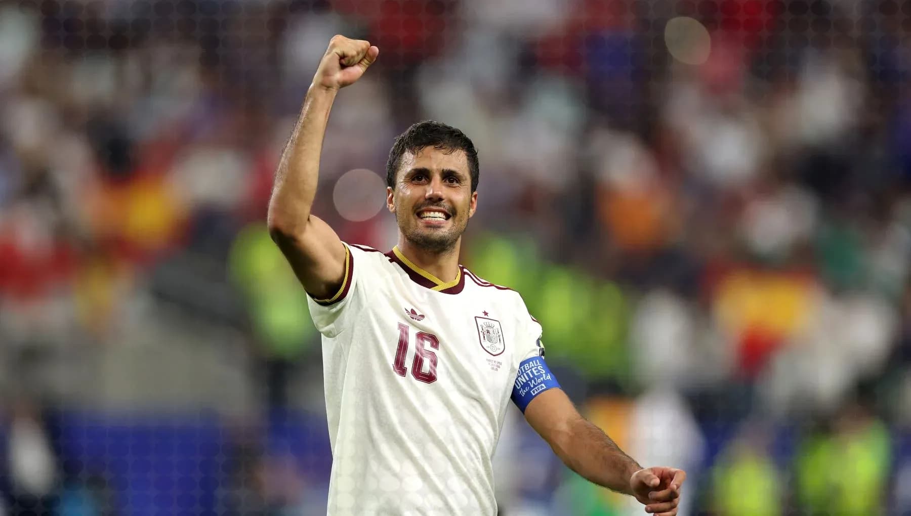 Player celebrating with raised fist after match