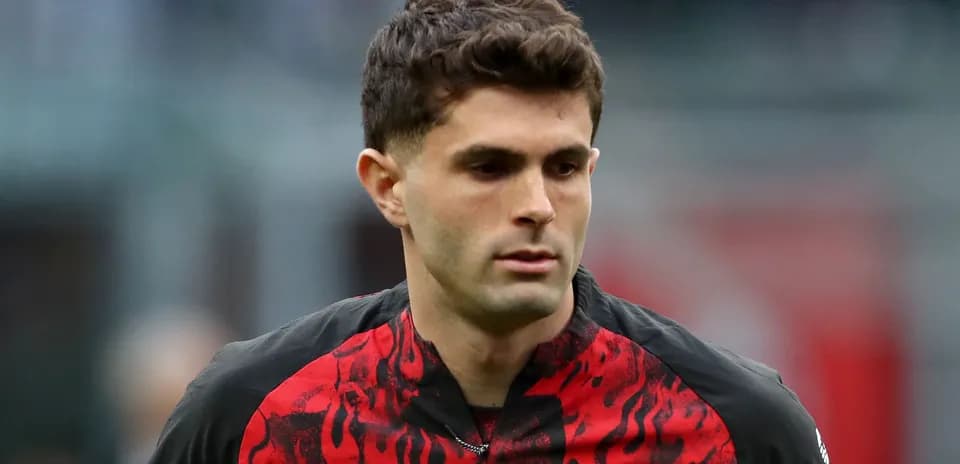 Player wearing AC Milan jersey during match