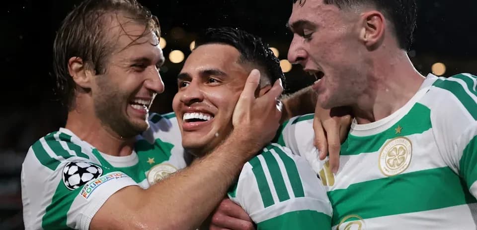 Celtic players celebrating a goal on the field