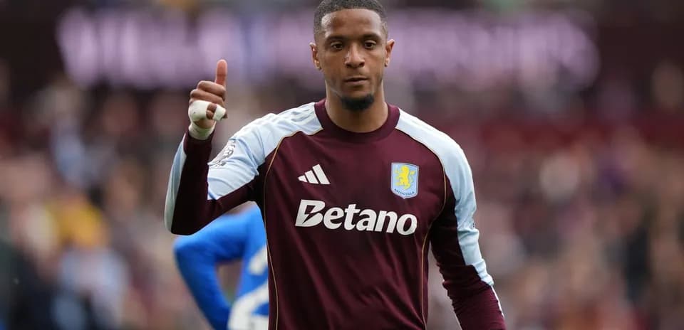 Goalkeeper gesturing during match for Aston Villa