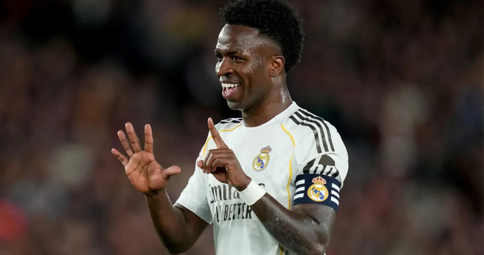 Player celebrating with fingers raised during match