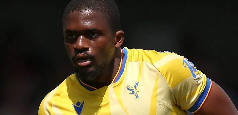 Player wearing yellow jersey during match action