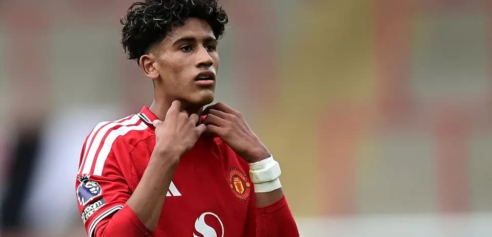 Young player adjusting his collar during match
