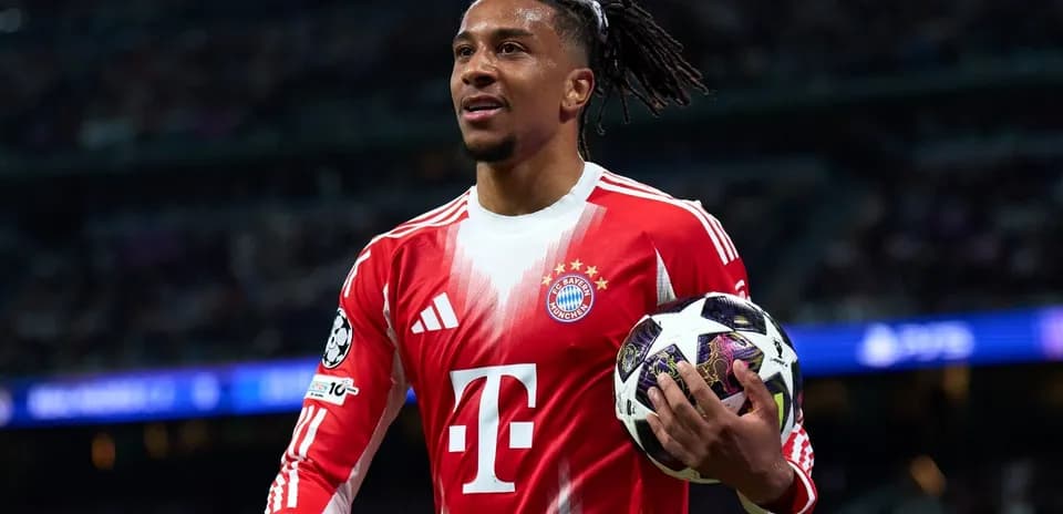 Player holding ball during UEFA Champions League match