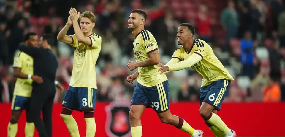 Players celebrating victory after match conclusion