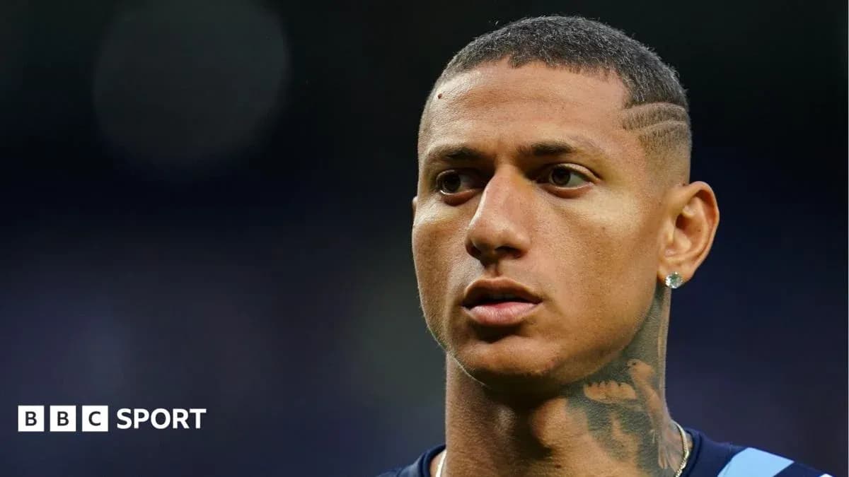 Player with short hair and tattoos during match