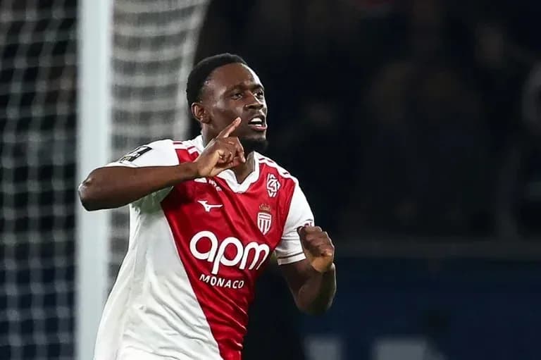 Player celebrating goal with finger to lips