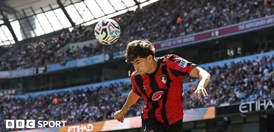 Bournemouth player heading the ball during match
