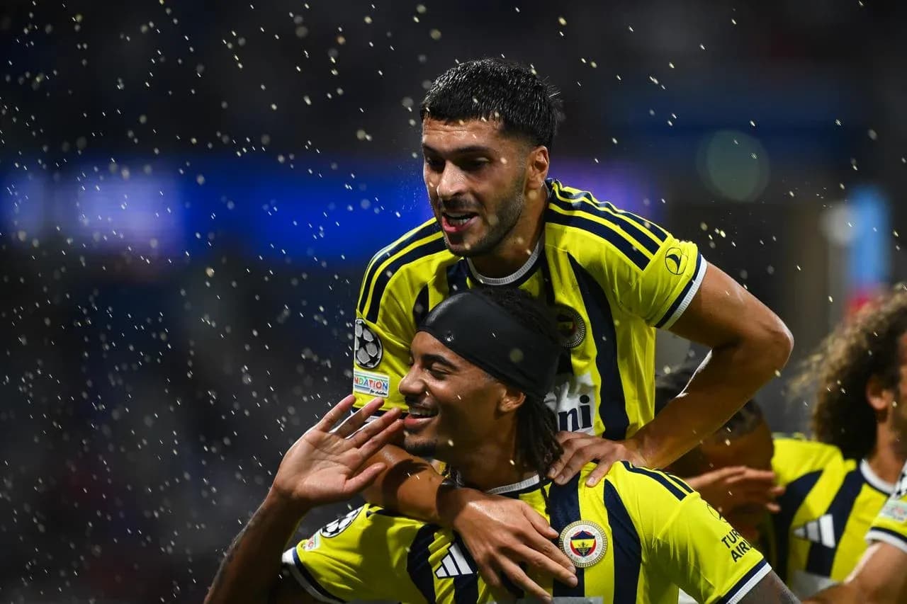 Fenerbahçe players celebrating a goal during match