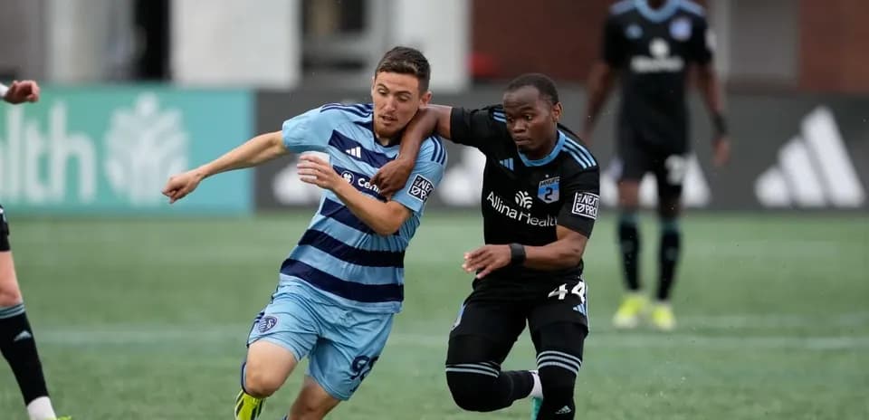 Player battling for possession during match