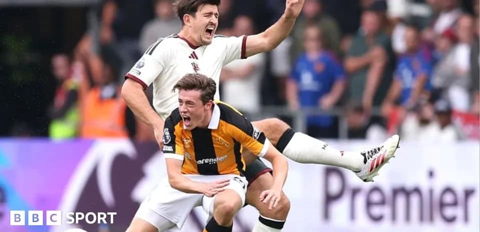 Two players competing during a football match