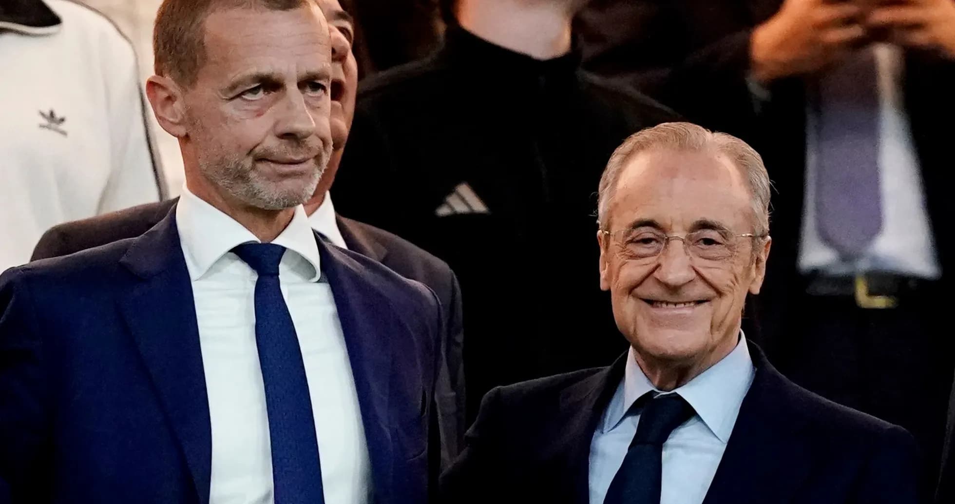 UEFA President and Real Madrid President at event