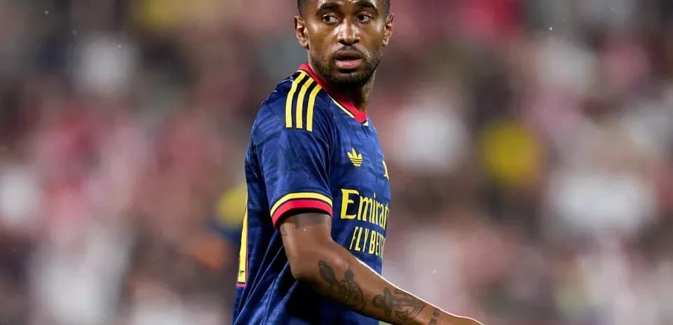 Player in blue jersey looking during match