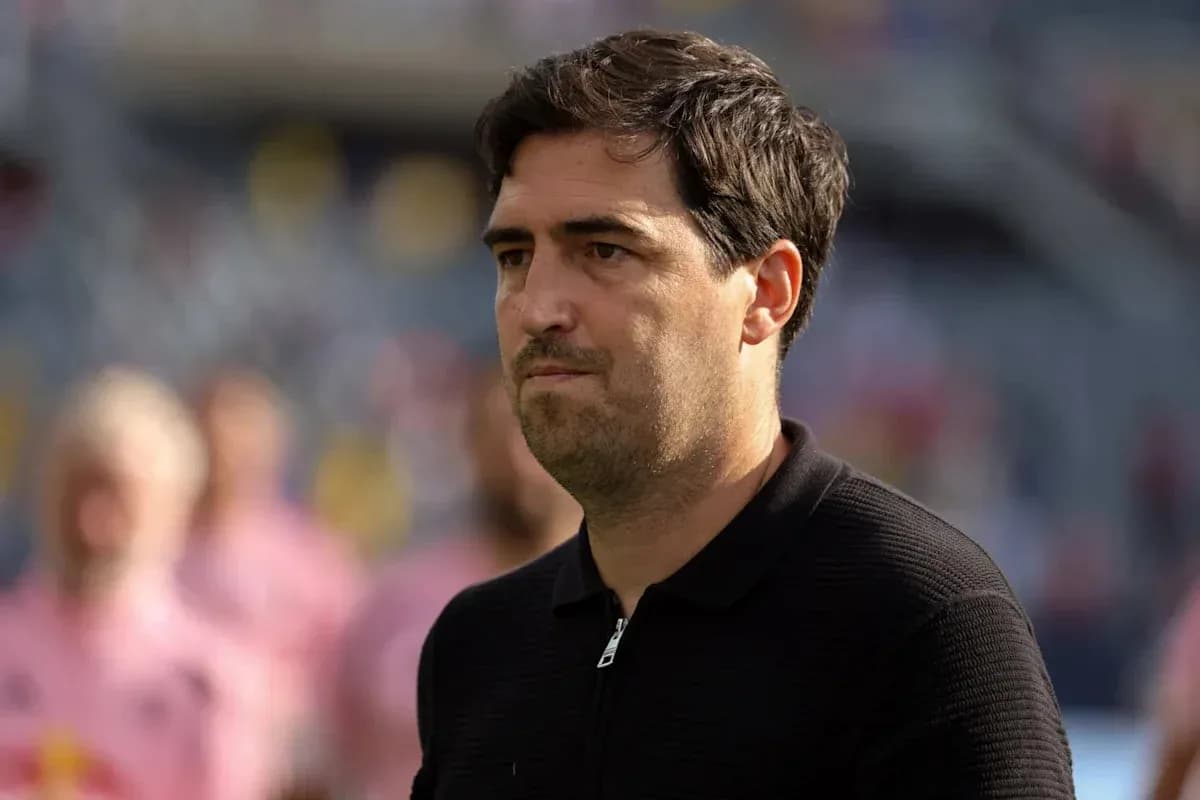 Coach observing the match from the sideline