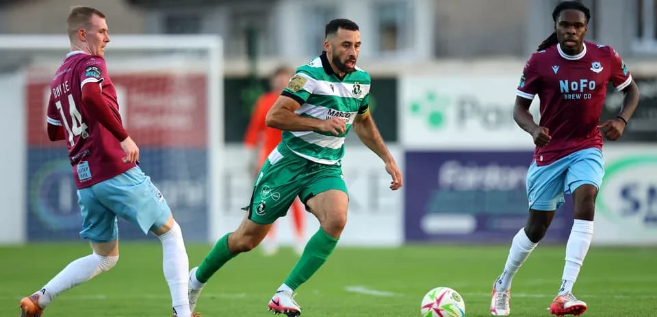Player dribbling the ball during Europa League match