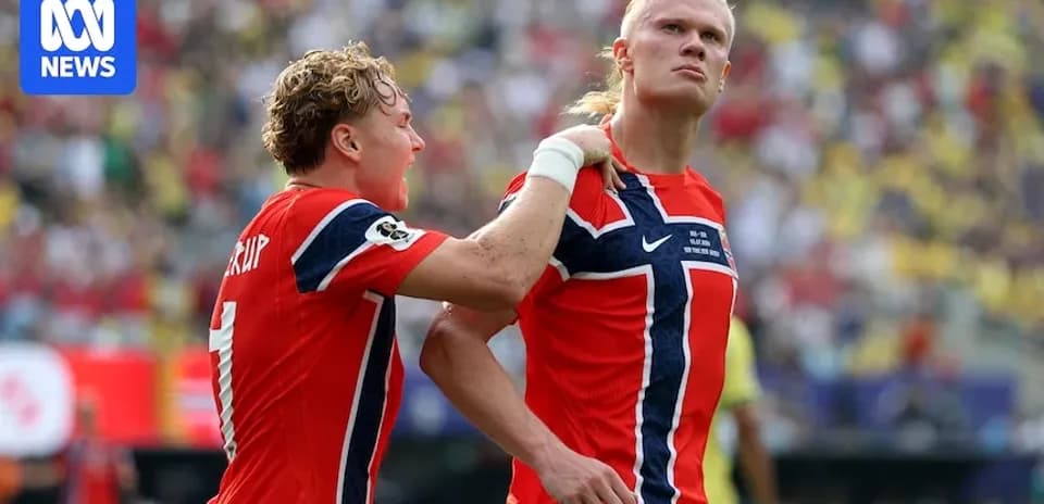 Norwegian players celebrating a goal on the field