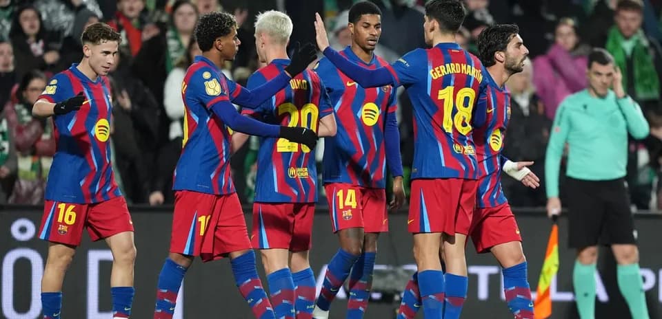 Barcelona players celebrating a goal during match