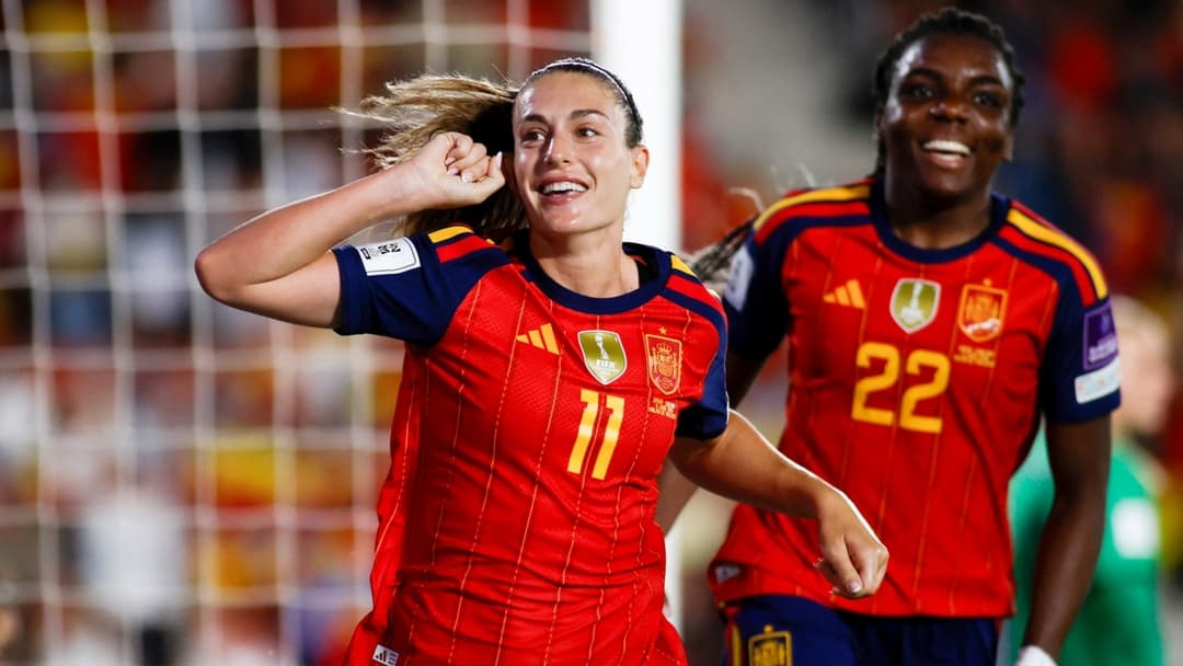 Spain players celebrating after scoring a goal
