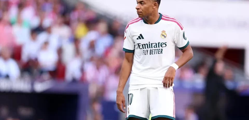 Kylian Mbappé in Real Madrid kit during match