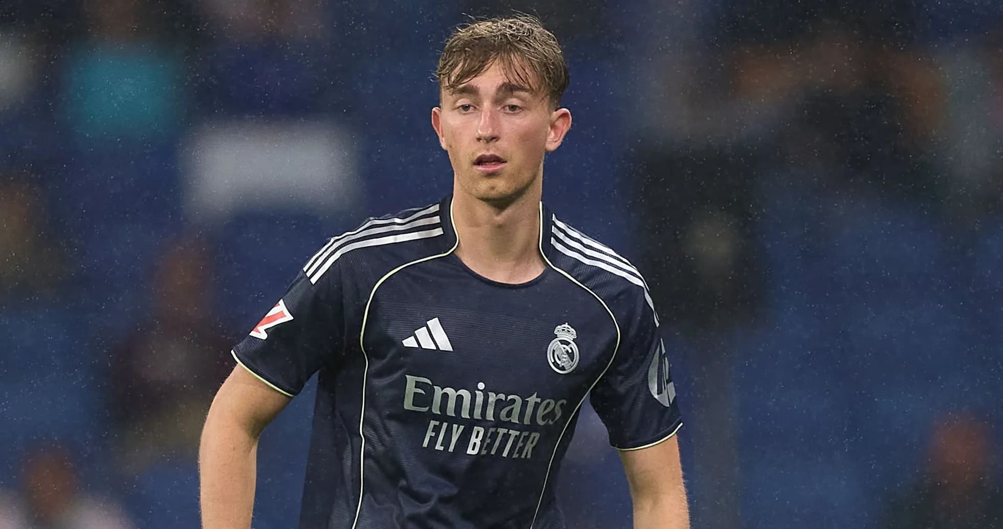 Player wearing Real Madrid jersey on the pitch