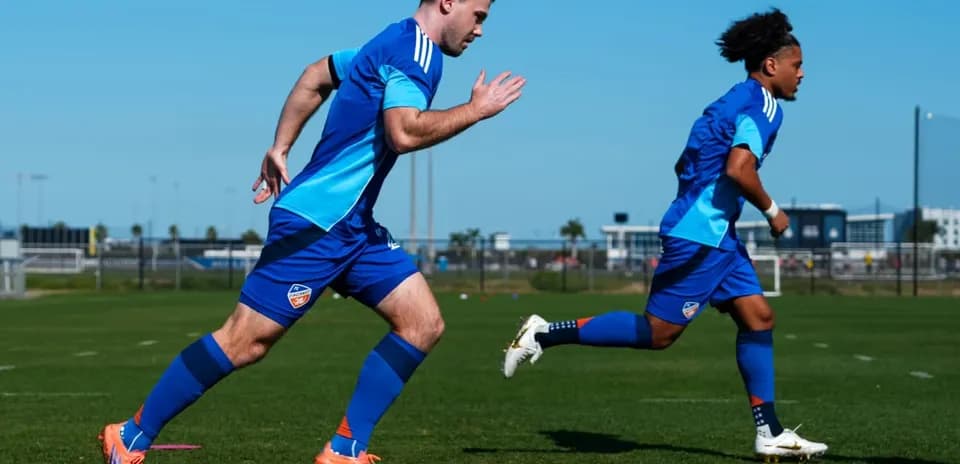 Two players training on the football field