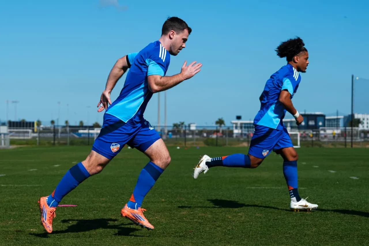 Two players training on the football field