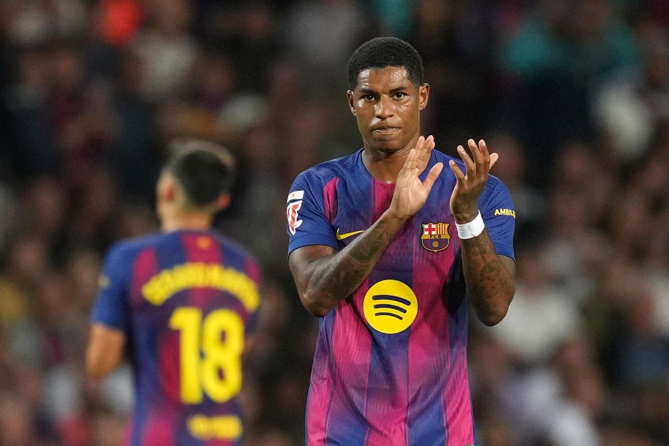 Player applauding during a match for Barcelona