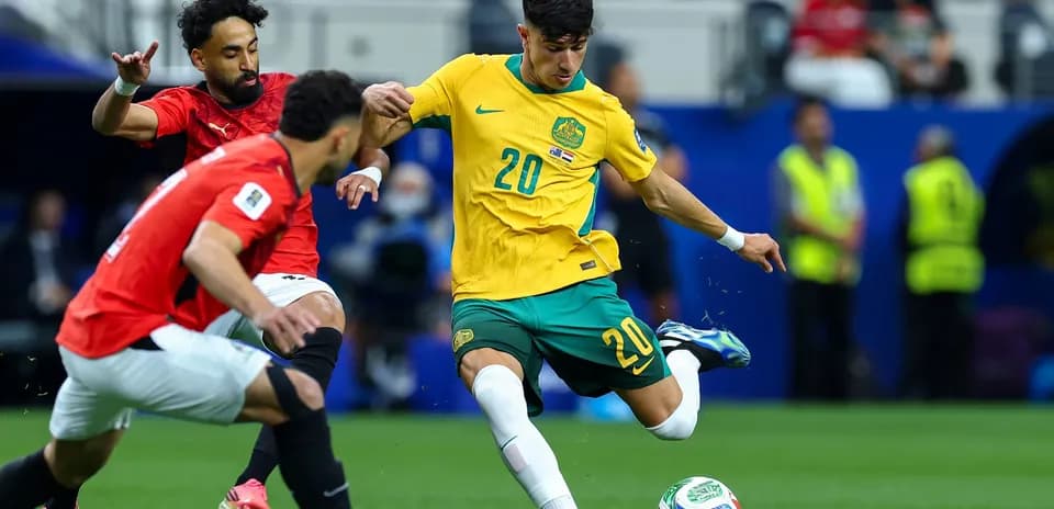 Player from Australia dribbling the ball against Egypt