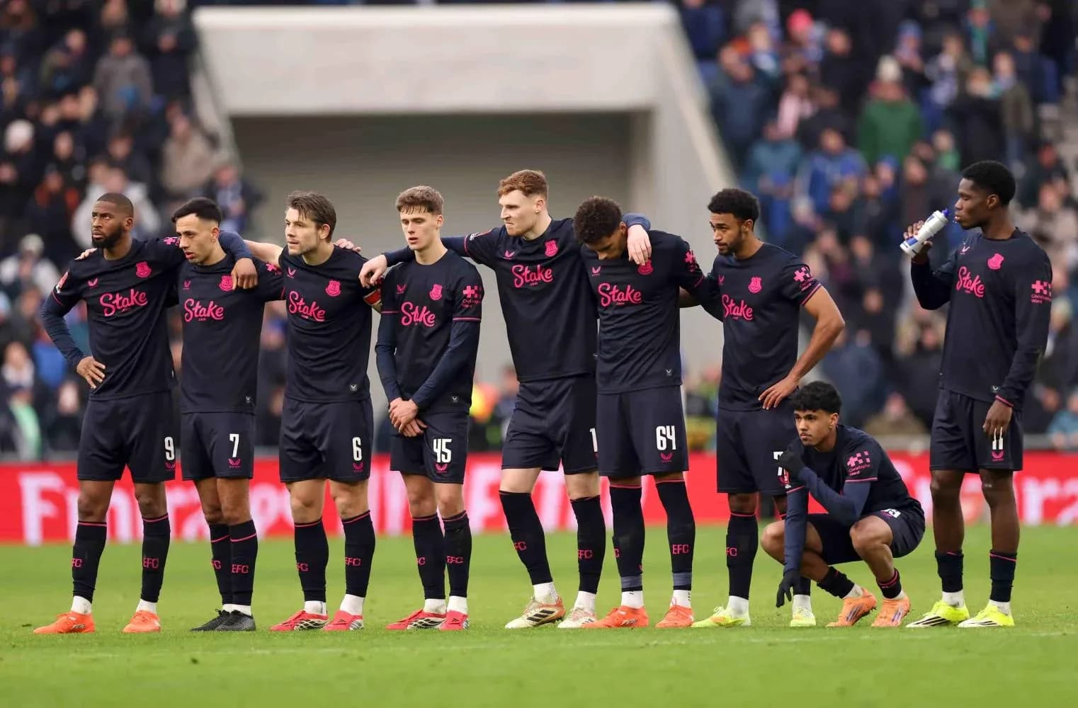 Everton players lined up during match