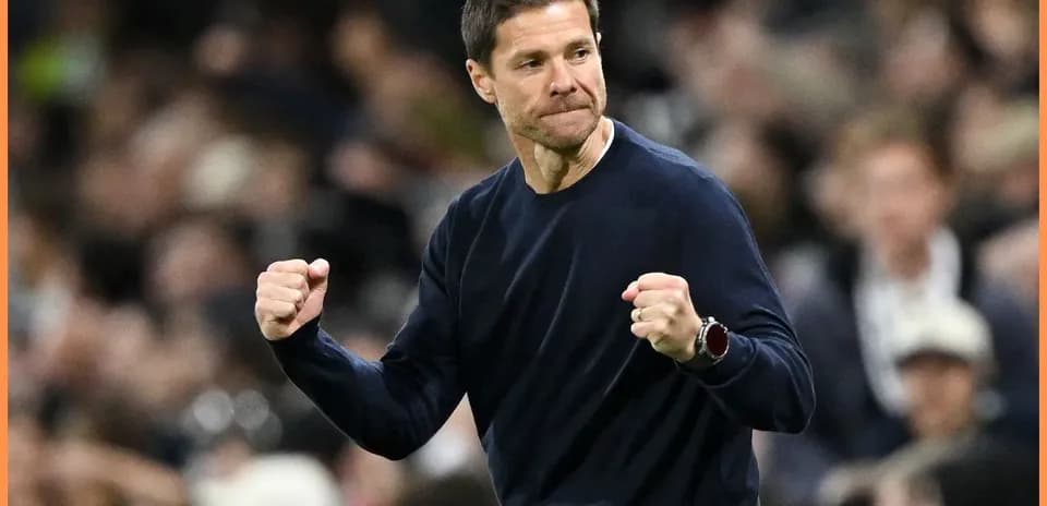 Coach celebrating during a match on the sidelines