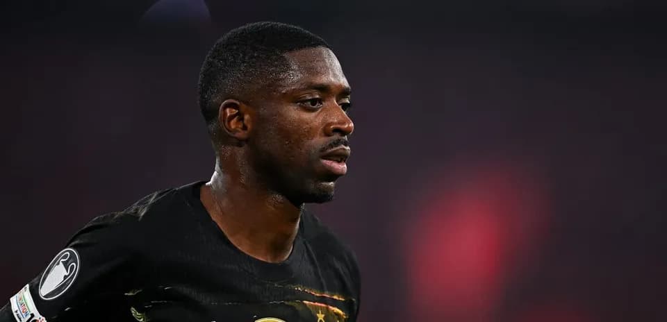 Player in black kit during match action