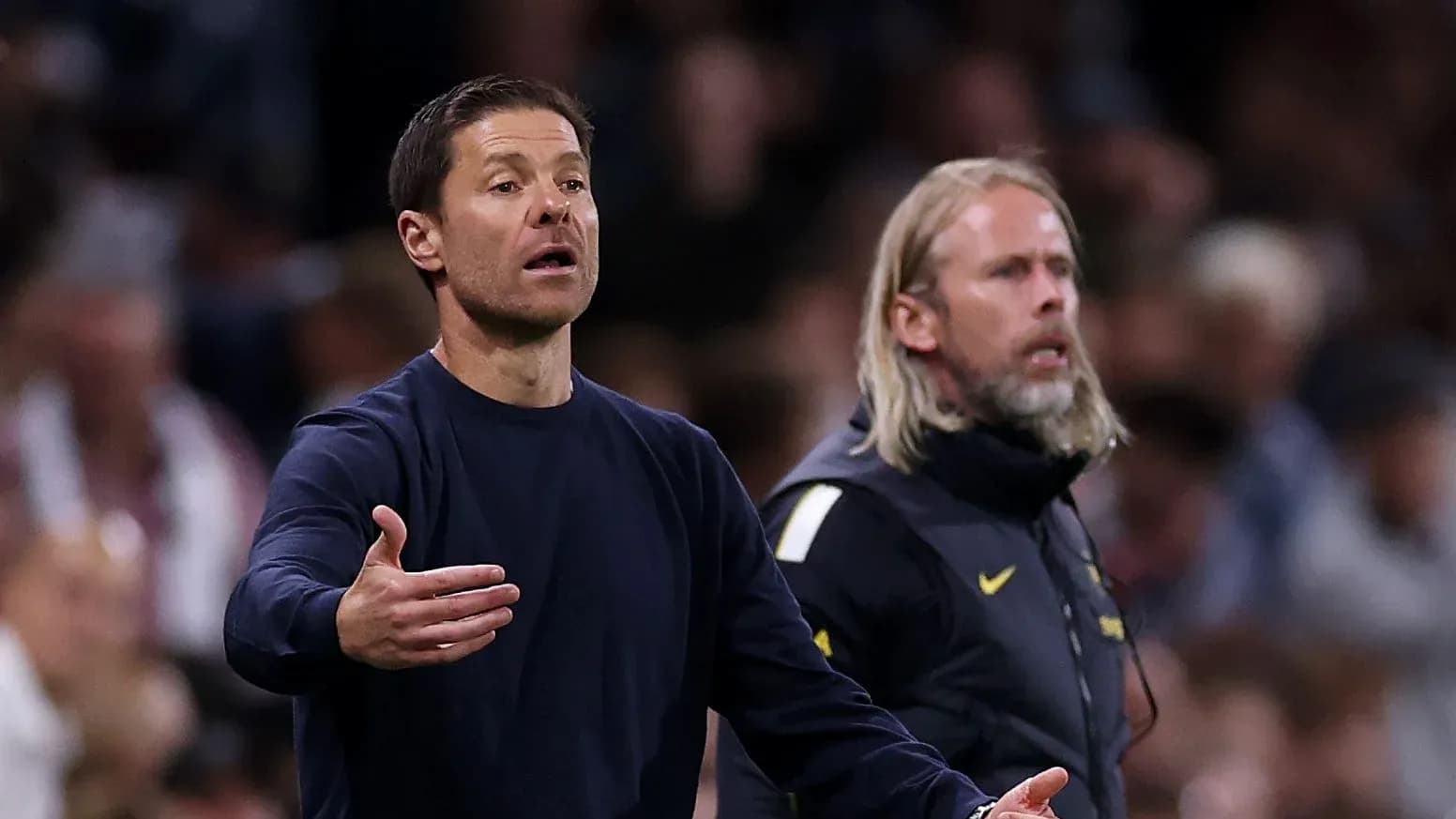 Coaches giving instructions during a match