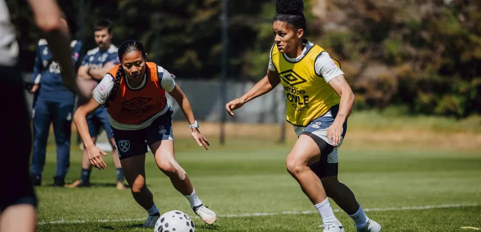 Two players training during football practice session