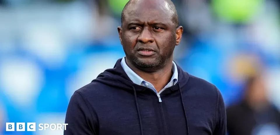 Manager observing the match from the sidelines